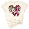 Leopard pattern heart with a pink awareness ribbon and decorative accents.