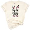 A cheerful Easter bunny with colorful eggs designed for children and family celebrations.