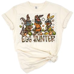 A cute bunny with Easter eggs and turquoise gemstone elements in a fun Western style.