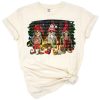 A playful group of skeleton gnomes dressed in Christmas hats and outfits surrounded by festive decorations.