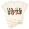Charming illustration of a Christmas coffee latte cup surrounded by snowmen with festive winter accents.