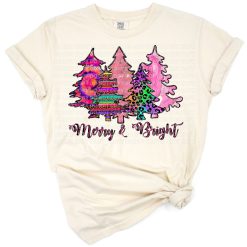 Pink Christmas tree with snowflakes and a merry and bright theme.