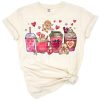 Cute illustration of coffee drinks with hearts and Valentine’s Day accents.